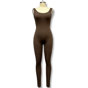 Detail of a dark brown sleeveless tight yoga jumpsuit with high elastic fit on a mannequin