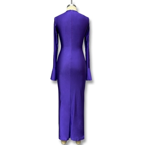 Detail of deep purple slim fit maxi dress with back zipper and elegant flared sleeves