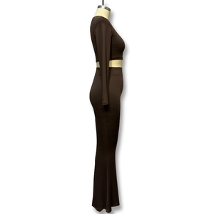 Detail view of dark brown ribbed two-piece set featuring a crop top and flared pants