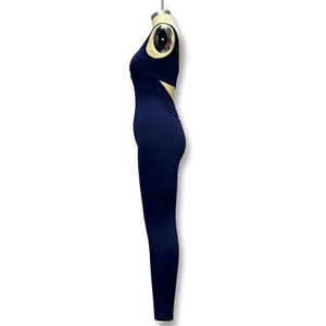 Detail of side waist cutout on a navy blue sleeveless athletic compression bodysuit