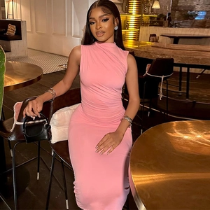 Detail of pink sleeveless turtleneck knit dress with slim fit and elegant texture
