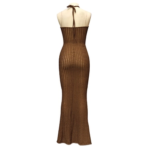 Detail of deep brown halter neck maxi dress featuring open back and ribbed knit texture