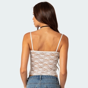 Detailed back view of white floral lace camisole with thin elastic shoulder straps