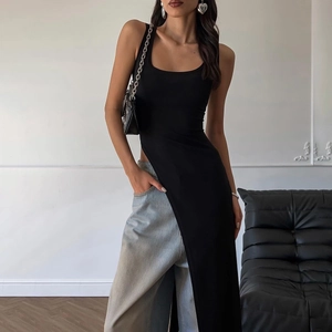 Detail shot of black sleeveless slim fit top with high side slit and round U-neckline