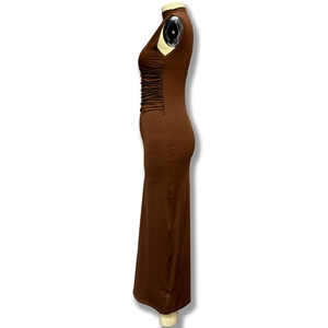 Detail view of ruched side seams on a chocolate brown sleeveless maxi dress