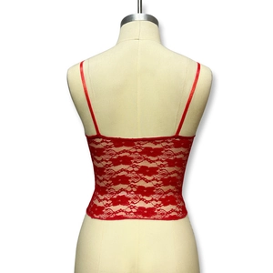 Detail view of the back of this red floral lace camisole featuring delicate mesh texture