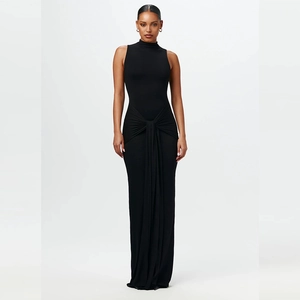 Detail of the elegant waist knot and pleated texture on this black sleeveless maxi dress