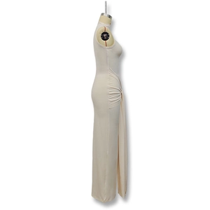 Detailed side view of beige sleeveless bodycon dress with side ruching and long drape