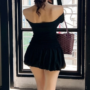 Elegant black off-the-shoulder puff dress with backless design and stylish short skirt