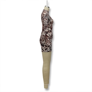 Detailed side view of leopard print bodysuit featuring elastic slim fit and round neck