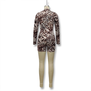 Detail of the leopard print romper featuring a fitted cut and hidden back zipper