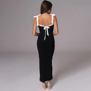 Elegant sleeveless backless black maxi dress with contrast white bow tie shoulder straps