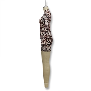 Side view of leopard print long sleeve bodycon mini dress on a mannequin model