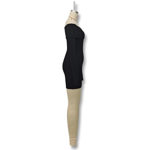 Detail view of black off-the-shoulder slim fit knit mini dress on a mannequin