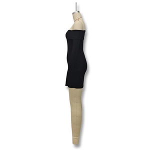 Side view of black off-the-shoulder slim fit long sleeve knit dress on mannequin