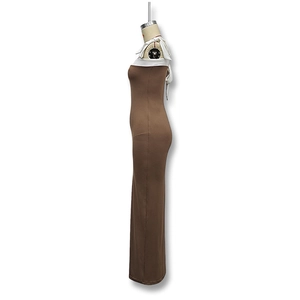 Detail view of coffee brown slim fit maxi dress featuring white contrast neckline and ties