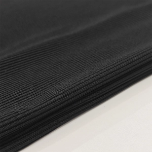Detailed close-up of black ribbed knit fabric showing vertical texture and high elasticity