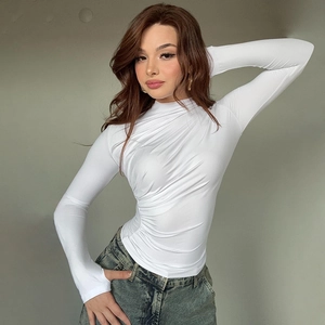 Women's slim fit white long sleeve ruched top with thumbhole details and high neck