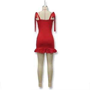 Close-up of red bodycon dress with adjustable bow straps and elegant ruffled hemline