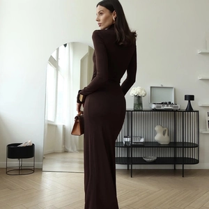 Elegant dark brown slim fit turtleneck maxi dress with long sleeves and high slit details