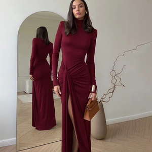 Detailed view of wine red bodycon dress featuring elegant waist knot and high leg slit