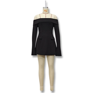 Detail view of black off-shoulder dress featuring decorative pocket flaps and slim straps