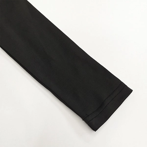 Detail of the high-density knitted sleeve cuff with precise double-needle stitching