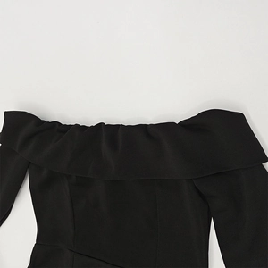 Detail of off-the-shoulder neckline with wide ruffled folds on black A-line dress