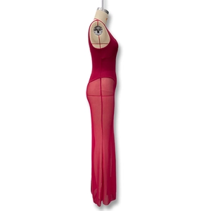 Detail of red mesh patchwork long dress with slim fit bodice and sheer layered skirt
