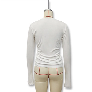 Detailed back view of white slim fit crew neck top showing quality stitching and soft fabric