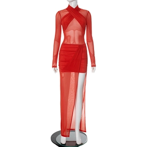 Detail of red mesh patchwork dress with criss-cross neck and long sheer sleeves