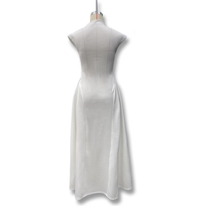 Detail of white sleeveless maxi dress with mandarin collar and elegant A-line silhouette