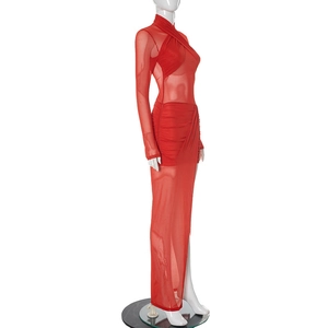 Detail of red mesh bodycon dress featuring sheer fabric textures and side slit design