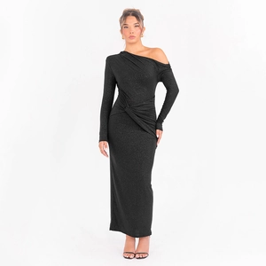 Detail of elegant black off-shoulder long sleeve dress with shimmering glitter fabric texture