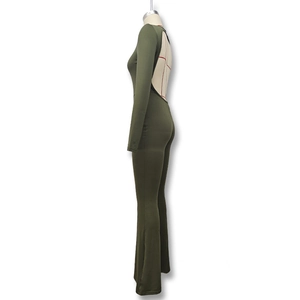 Detail view of the sexy backless design and slim fit cut of this army green jumpsuit