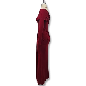 Close-up of wine red bodycon dress featuring elegant ruched details and off-shoulder design