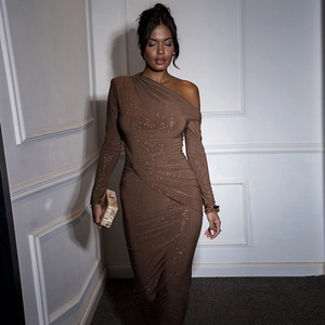 Detail of glittery brown off-shoulder dress featuring ruched waist and side knot