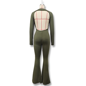 Detail of the deep U-shaped backless design on this slim-fit olive long sleeve jumpsuit