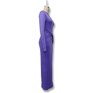 Detailed view of the purple ruched waist knot and side pleats on a slim fit dress