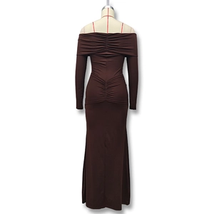 Detail of ruched back seam on a dark brown off-shoulder long sleeve bodycon maxi dress