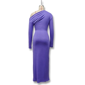 Detail of purple shimmering one-shoulder long sleeve dress with ruched bodycon fit
