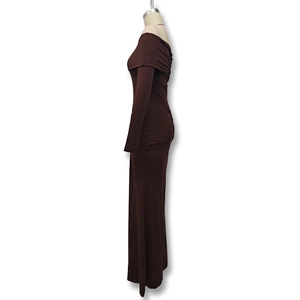 Detail view of the chocolate brown off-shoulder dress featuring sleek side ruching texture