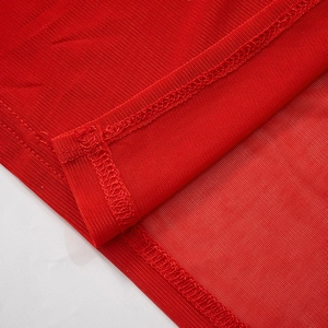 Close-up of red mesh fabric showing detailed stitching and high-quality edge overlock