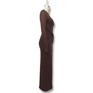 Detailed view of dark brown glitter fabric with stylish side knot ruching on dress