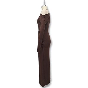 Detail view of brown glitter fabric and ruched side seam on slim fit off-shoulder dress
