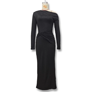 Detailed view of the waist ruching and sparkling fabric of the black off-shoulder dress