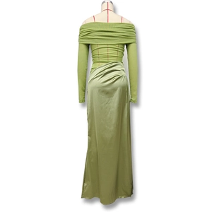 Detail of avocado green off-shoulder dress with mesh splicing and satin pleated finish