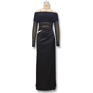 Detail of off-the-shoulder mesh top with ruched texture and matching bodycon skirt