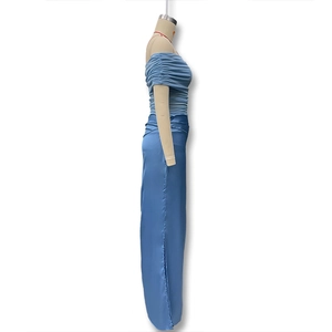 Detail view of ruched off-shoulder blue bodycon dress with side slit and satin finish
