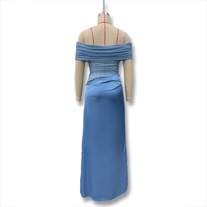 Detail of light blue off-shoulder evening dress featuring pleated waist and satin fabric